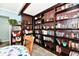 Well-organized dining area with bookshelves and a wooden chair at 2700 Yellowwood Ct, Columbus, IN 47203