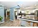 Bright kitchen with white cabinets, granite countertops, and stainless steel appliances at 2700 Yellowwood Ct, Columbus, IN 47203