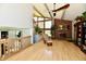 Spacious living room with vaulted ceilings, brick fireplace, and natural light at 2700 Yellowwood Ct, Columbus, IN 47203