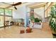 Open living room with vaulted ceilings and natural light from the large windows at 2700 Yellowwood Ct, Columbus, IN 47203