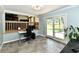 Spacious office with ample natural light, workstation, and outdoor access at 2700 Yellowwood Ct, Columbus, IN 47203