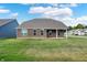 Well-maintained backyard with brick home and lush green grass at 2795 Lanai Ln, Greenwood, IN 46143