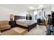 Spacious bedroom with natural light, includes an exercise area and a comfortable seating arrangement at 2795 Lanai Ln, Greenwood, IN 46143