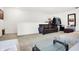 Living room featuring a plush sofa, carpeted floors, with plenty of space for relaxation and entertainment at 2795 Lanai Ln, Greenwood, IN 46143