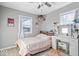 Cozy bedroom with natural light, a vanity, and ample space for storage at 300 Indiana Ave, Pendleton, IN 46064
