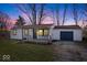 Charming home featuring a manicured lawn, covered porch, and an attached garage, great for outdoor entertaining at 300 Indiana Ave, Pendleton, IN 46064