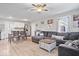 Bright living room open to dining and kitchen area, features hardwood flooring and lots of natural light at 300 Indiana Ave, Pendleton, IN 46064
