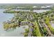 Stunning aerial view of lakeside community with lush landscaping and private boat docks at 3539 Clearwater Cir, Indianapolis, IN 46240