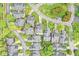 Overhead view of well-maintained neighborhood featuring lush green lawns and tree-lined streets at 3539 Clearwater Cir, Indianapolis, IN 46240