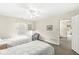 Bedroom features twin beds, neutral walls, and a connected hallway at 3539 Clearwater Cir, Indianapolis, IN 46240