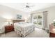 Cozy bedroom with a comfortable bed, sliding glass doors to the outdoor patio, and ample natural light at 3539 Clearwater Cir, Indianapolis, IN 46240