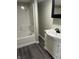 Bathroom features a shower-tub combination and modern vanity at 354 Bloomingdale Rd, Montezuma, IN 47862