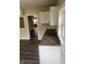 Bright kitchen features white cabinets, dark countertops, and stainless steel hardware at 354 Bloomingdale Rd, Montezuma, IN 47862
