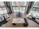 Open-concept floorplan with modern kitchen, dining and living rooms with expansive views and natural light at 395 Breakwater Dr, Fishers, IN 46037