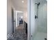 Contemporary bathroom with a glass-enclosed shower and stylish fixtures at 395 Breakwater Dr, Fishers, IN 46037