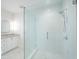 Bathroom with a glass-enclosed shower, mosaic tile, and a vanity with modern fixtures at 395 Breakwater Dr, Fishers, IN 46037