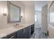 Modern bathroom featuring a spacious vanity and stylish fixtures at 395 Breakwater Dr, Fishers, IN 46037