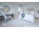 Calm bedroom showcasing tray ceilings, carpet floors, and a modern decorative design at 395 Breakwater Dr, Fishers, IN 46037