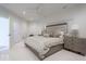 Bedroom featuring neutral decor, plush carpeting, gray furniture, and a ceiling fan at 395 Breakwater Dr, Fishers, IN 46037