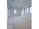 Spacious bedroom with lots of natural light, recessed lighting, and plush carpeting at 395 Breakwater Dr, Fishers, IN 46037