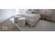 Inviting bedroom with stylish accents, comfortable bed, and soft rug at 395 Breakwater Dr, Fishers, IN 46037