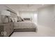 Bedroom featuring neutral decor, plush carpeting, and a statement headboard at 395 Breakwater Dr, Fishers, IN 46037
