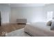 Bright bedroom featuring hardwood floors and stylish furnishings at 395 Breakwater Dr, Fishers, IN 46037