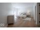 Bright bedroom featuring a soft bed, ottomans, and natural light at 395 Breakwater Dr, Fishers, IN 46037