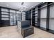 Spacious walk-in closet with custom shelving, drawers, and a stylish center island at 395 Breakwater Dr, Fishers, IN 46037