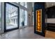 Stunning foyer with high ceilings, striking black accents, and large windows at 395 Breakwater Dr, Fishers, IN 46037