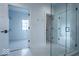 Hallway featuring doorways to a walk-in closet and a modern bathroom at 395 Breakwater Dr, Fishers, IN 46037