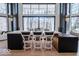 Modern kitchen island with white marble countertop and stylish bar stools at 395 Breakwater Dr, Fishers, IN 46037