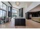Stylish kitchen featuring sleek island and cabinets, stainless steel appliances, and modern lighting at 395 Breakwater Dr, Fishers, IN 46037