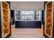 Gourmet kitchen with spacious island, black cabinetry, and high-end appliances at 395 Breakwater Dr, Fishers, IN 46037