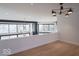 Spacious living room showcasing pendant lighting and an open floor plan at 395 Breakwater Dr, Fishers, IN 46037