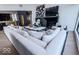 Cozy living room with a large sofa and fireplace, perfect for relaxation at 395 Breakwater Dr, Fishers, IN 46037