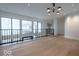Upper room with view of the landscape, hardwood floors, and pendant lights at 395 Breakwater Dr, Fishers, IN 46037