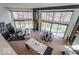 Open-concept living area showcases soaring ceilings, lake views, and an oversized island at 395 Breakwater Dr, Fishers, IN 46037