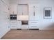 Butler's pantry features custom cabinets and plenty of storage for the discerning home chef at 395 Breakwater Dr, Fishers, IN 46037
