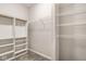 Spacious walk-in closet with shelving and rod to maximize storage at 401 Thomas Point Dr, Fortville, IN 46040