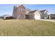 A shot of the 2-story home with a 2-car garage at 4213 Katie Ln, Indianapolis, IN 46239