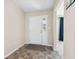 Foyer featuring neutral walls and tile floor at 4213 Katie Ln, Indianapolis, IN 46239