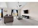 Cozy living room with carpet, window, ceiling fan, comfortable seating, and a TV area for relaxing at 4213 Katie Ln, Indianapolis, IN 46239