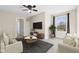Bright living room boasts stylish seating, natural light, and a peaceful atmosphere at 4213 Katie Ln, Indianapolis, IN 46239