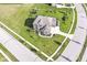 Aerial shot showcasing a home, a large yard, professional landscaping, a patio, and a three-car garage at 4255 Kettering Dr, Zionsville, IN 46077