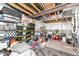 Unfinished basement area featuring exposed beams, storage and miscellaneous items at 4255 Kettering Dr, Zionsville, IN 46077