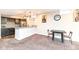 Finished basement featuring a kitchenette with bar seating and a dining area at 4255 Kettering Dr, Zionsville, IN 46077