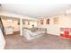 Spacious finished basement with comfortable seating and modern artwork at 4255 Kettering Dr, Zionsville, IN 46077