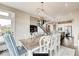 Inviting dining room boasts an open concept layout with access to the kitchen and lots of natural light at 4255 Kettering Dr, Zionsville, IN 46077