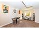 A cozy office area with neutral walls, carpet, and a workstation with shelving and natural light at 4255 Kettering Dr, Zionsville, IN 46077